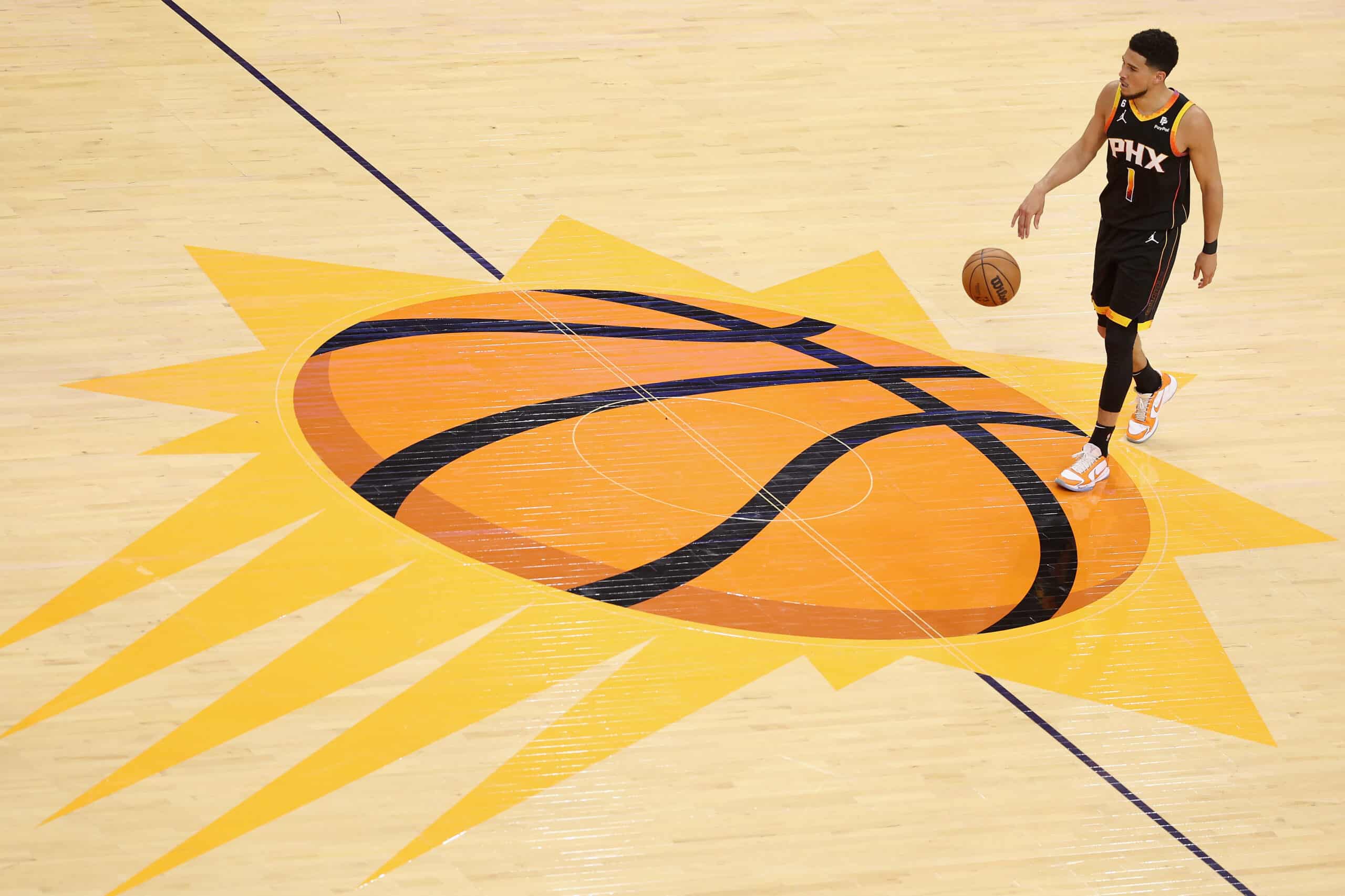 Devin Booker #1 of the Phoenix Suns handles the ball in game five of the Western Conference First Round Playoffs at Footprint Center on April 25, 2023 in Phoenix, Arizona. NOTE TO USER: User expressly acknowledges and agrees that, by downloading and or using this photograph, User is consenting to the terms and conditions of the Getty Images License Agreement.